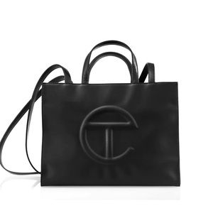 Brand new with tags still in original plastic Telfar medium shopper